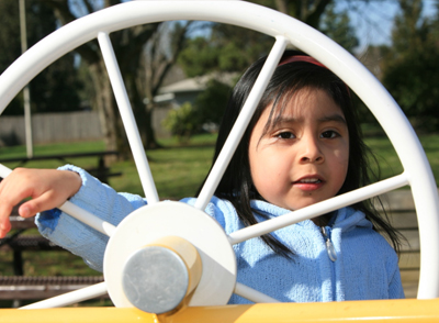 child playing on a playground