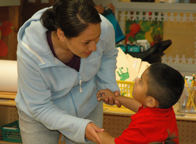 an adult talking with a child