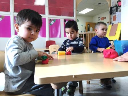 children playing at at table