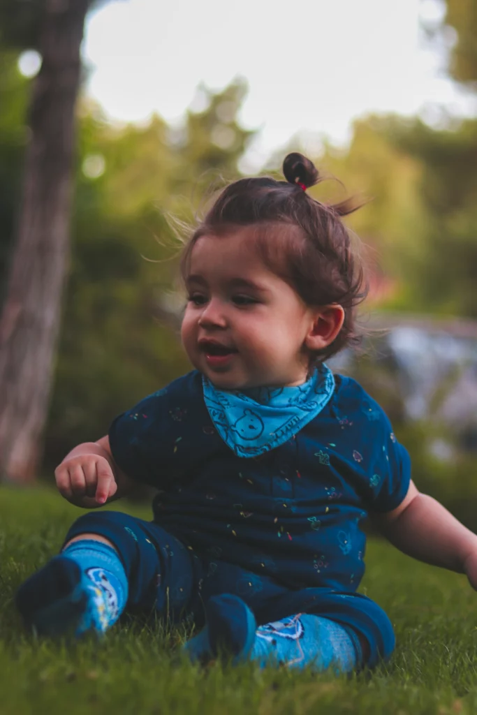 photo of a child in grass